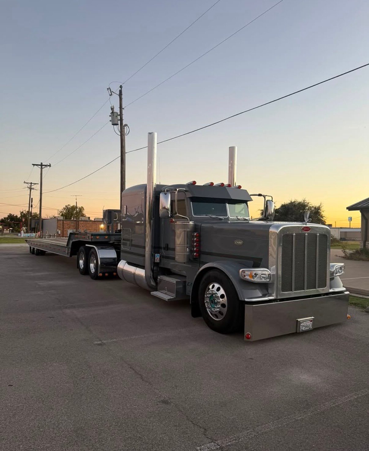 Carr Trucking semi truck with flatbed trailer