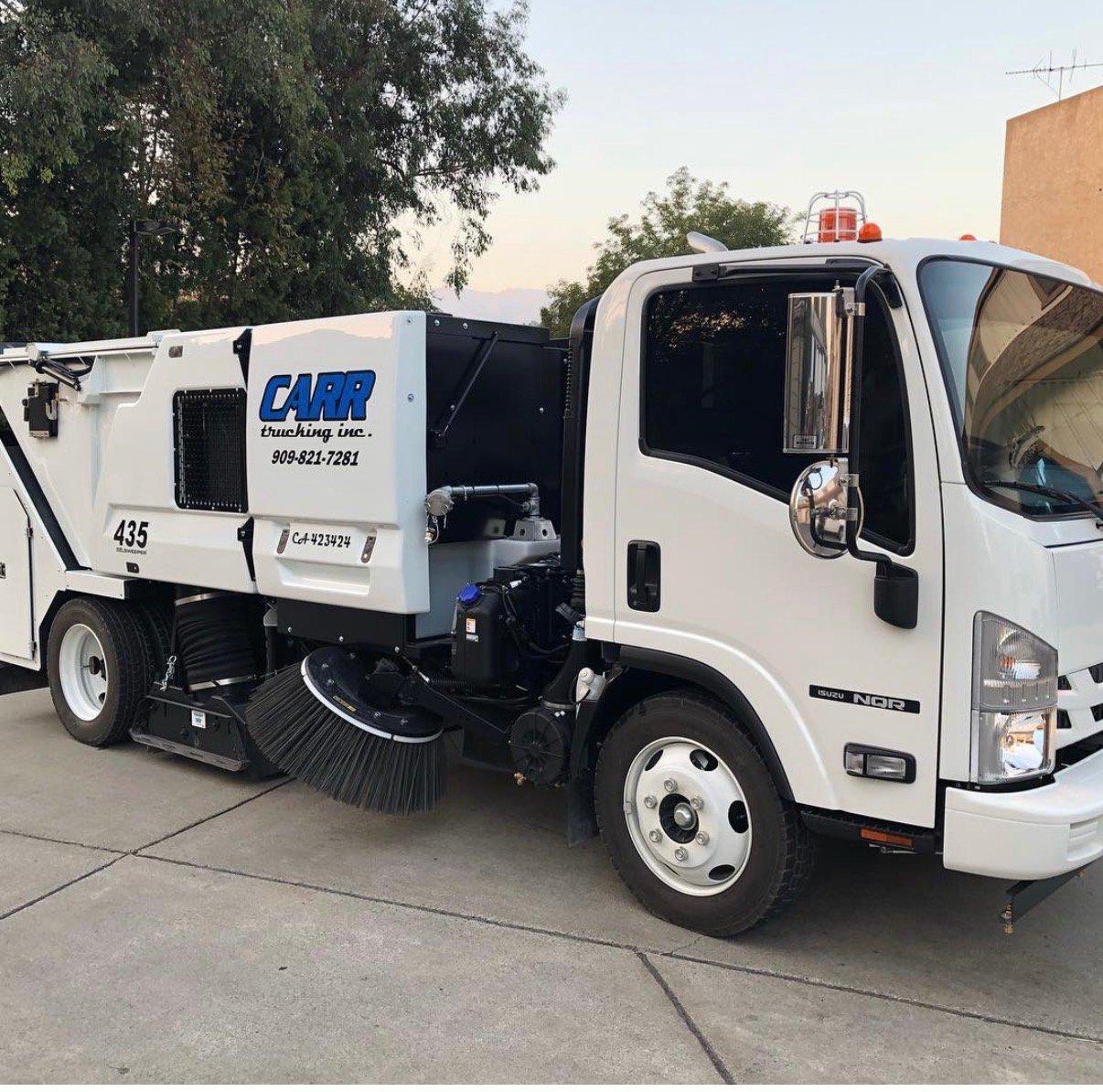 Carr Trucking street sweeper